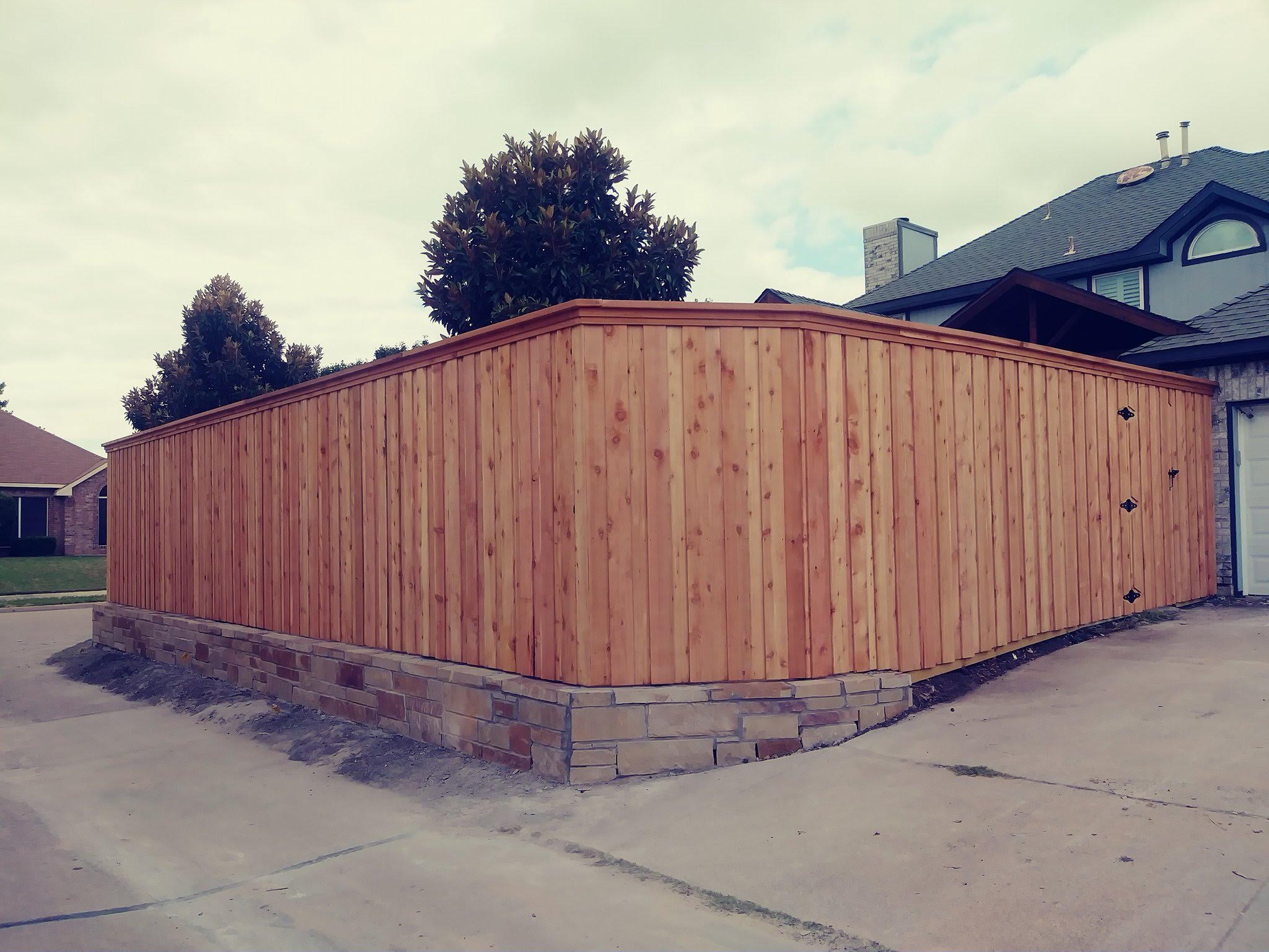 Wood privacy fence on a residential street