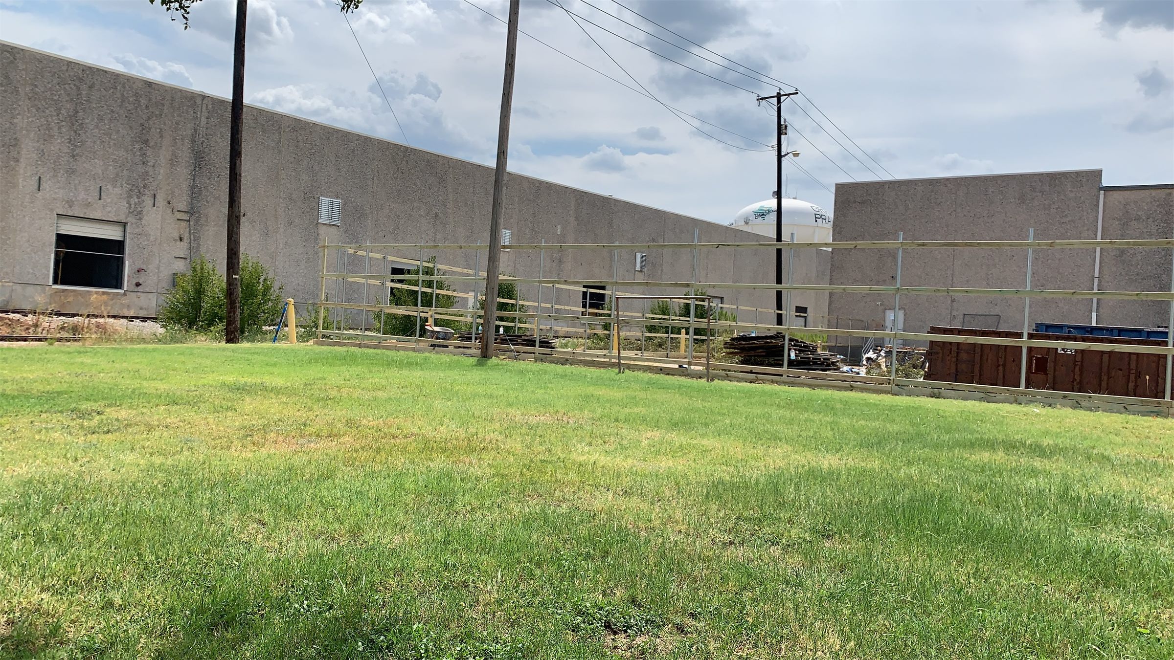 Commercial fence line behind a business property