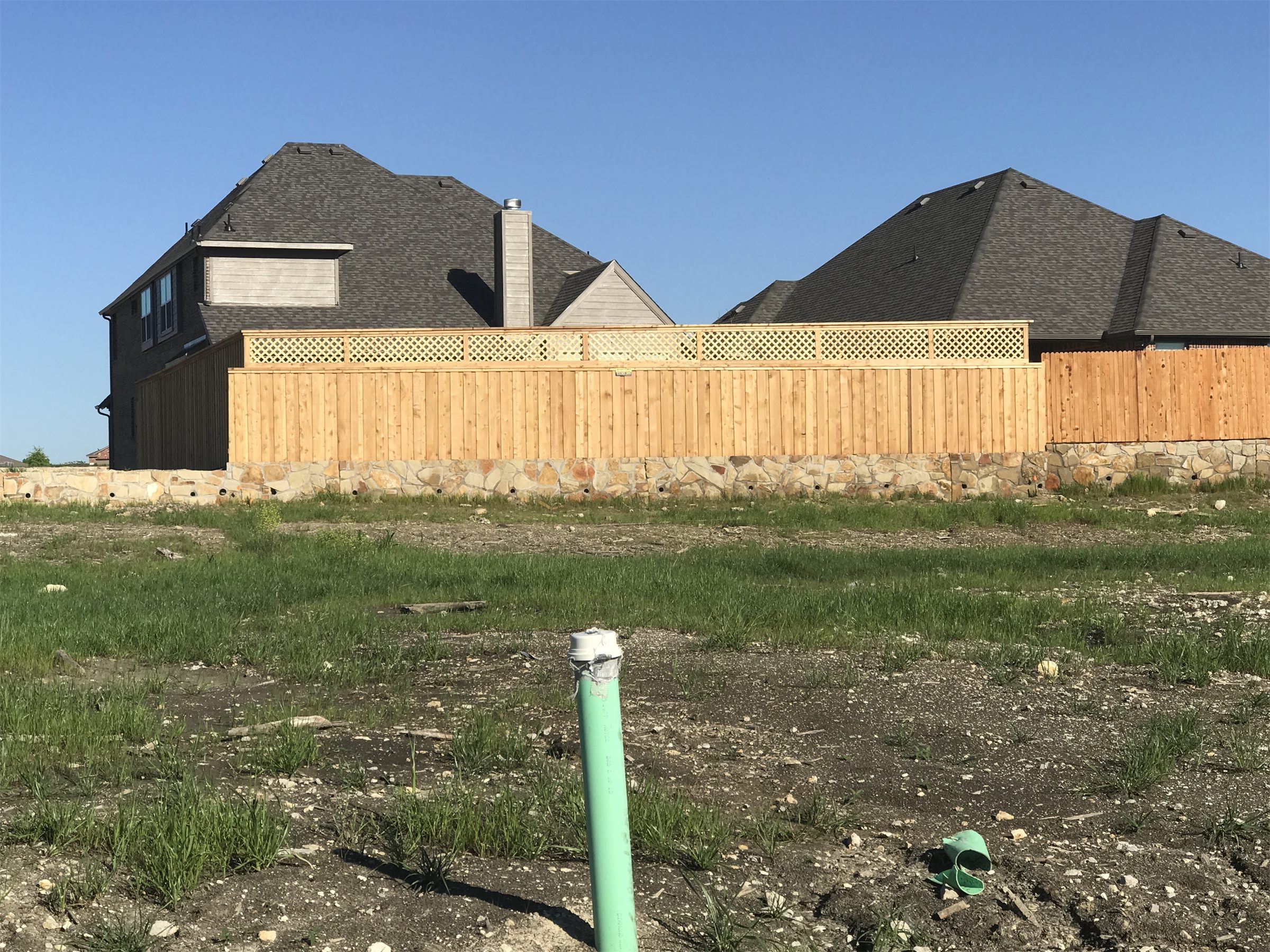 New wood privacy fence around a residential lot