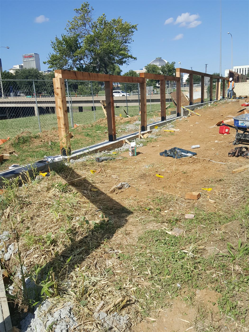 Fence posts set along a commercial property line