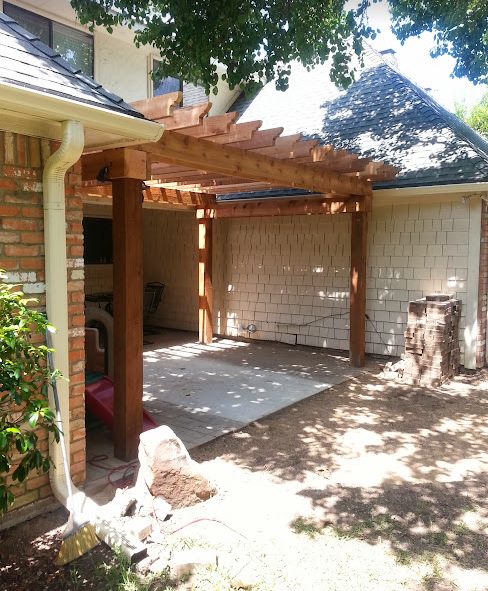 Covered patio with a concrete slab
